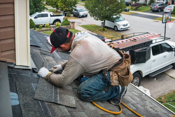 Professional Roof Inspection technician working in Flora, IL
